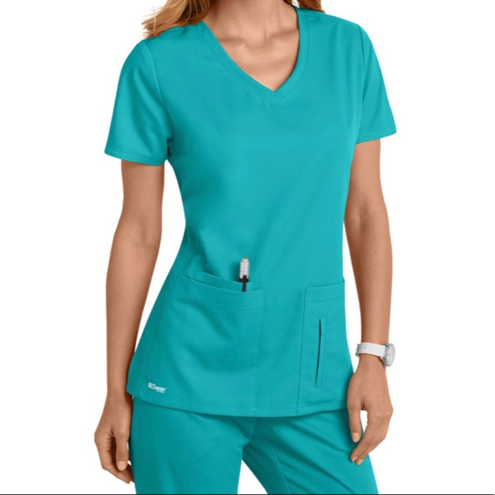 Medium Teal Grey’s Anatomy Scrubs. New with tags.
